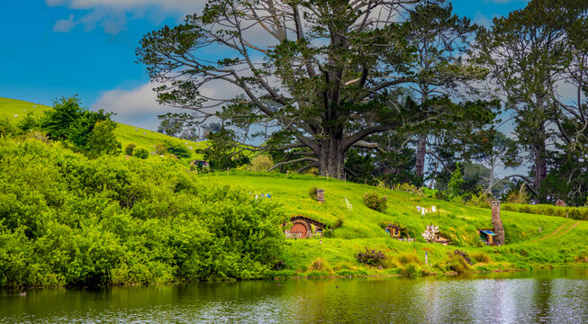 MATAMATA- NEW ZEALAND -NOVEMBER -2- 2022: Hobbiton - movie set created for filming the Lord of the Rings and "Hobbit" movies - Matamata, New Zealand,spring scene
