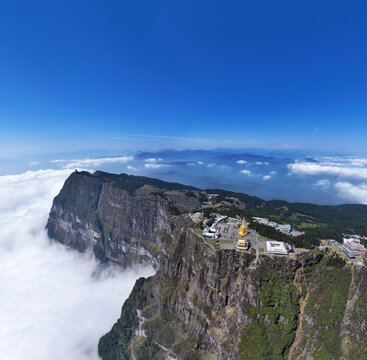 Aerial photography of the Ten Directions Samantabhadra of the Golden Summit and Golden Buddha on Mount Emei in Leshan, Sichuan Province