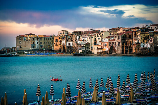 A magical summer holiday in Sicily. Cefal&ugrave;, and its ancient town at sunset.