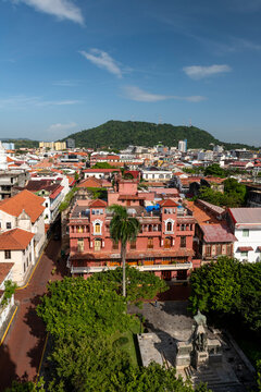 Aerial view appreciating the colorful colonial architecture of the casco viejo historic district in Panama city, with cerro anc&oacute;n and modern buildings completing the vibrant skyline, Central America -