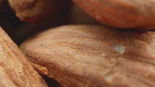 Almond nuts rotating slowly extreme macro close up stock footage