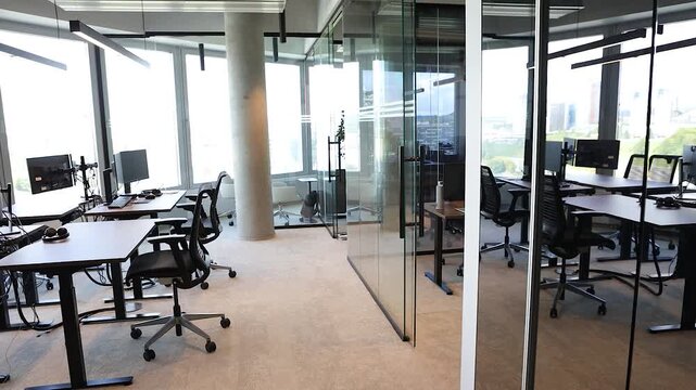 Pan around modern sity office building inside work station