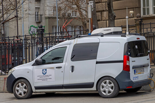 Mobile Lab Air Quality Monitoring Vehicle Parked at City Street