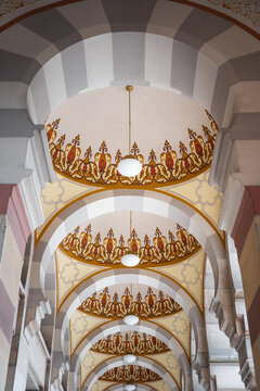 Sarajevo, Bosnia and Herzegovina - 07 May 2025: View of the Gazi Husrev-beg Mosque's arcade, its arches adorned with intricate patterns and soft lighting, creating a serene and majestic ambiance.