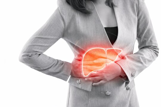 Woman in gray blazer holding right upper abdomen with glowing liver overlay, representing liver pain, liver disease, or digestive and medical health issues