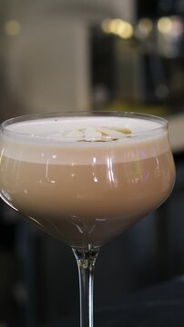 Foamy almond cocktail kulhad of Milk lassi prepared in an Indian hotel