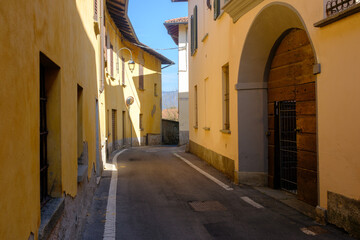 Obraz premium Old houses along via Lunga in Merate, Lecco province, Italy