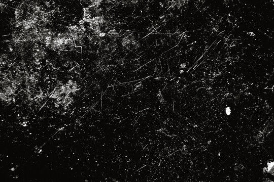 Black dust and noise texture with scratches and grain on dark background. Abstract monochrome composition, perfect for overlays, film effects, posters and grunge design.