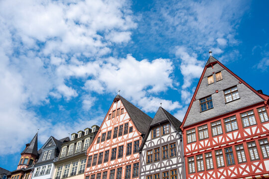 Frankfurt romerberg facade architecture in historic town with heritage travel mood and landmark presence under dramatic sky in Germany on bright day