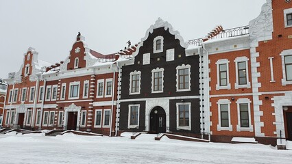Obraz premium Brugge Embankment in Yoshkar-Ola with flemish style architecture in winter, Russia