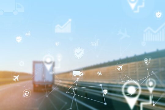 Logistics truck on highway with digital tracking graphics in motion at sunset