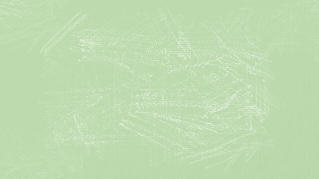 Light green desktop wallpaper with a chalk texture. The green background adds a soft, artistic touch, perfect for desktop wallpaper. Creative green textured background with copy space.