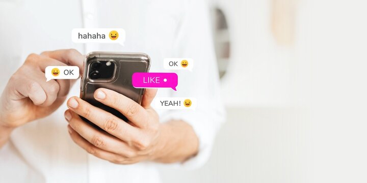 Businessman checking his social media account and messages on a phone