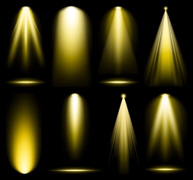 Golden spotlights illuminating darkness isolated element set