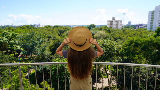 Visiting Cuiaba, Mato Grosso, Brazil. Young traveler woman on Cuiaba belvedere, Mato Grosso, Brazil.