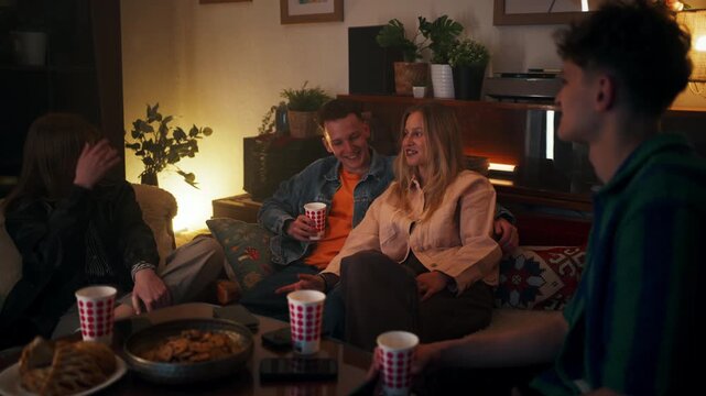 Friends enjoying a cozy evening at home