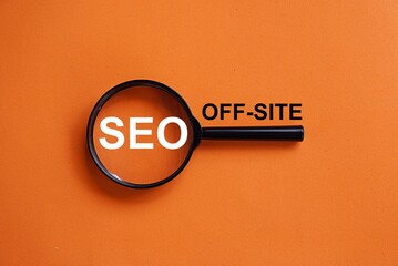 Off-Site words and Magnifying glass with the words SEO, online business concept, website optimization, search engine ranking, website index and rating © AhmadYani