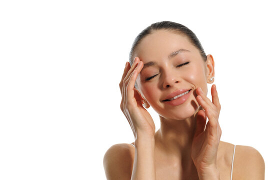 Portrait beautiful young woman with clean fresh skin. Cosmetology, beauty and spa