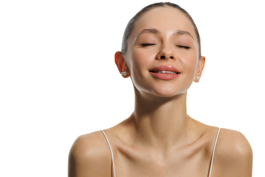 Portrait beautiful young woman with clean fresh skin. Cosmetology, beauty and spa