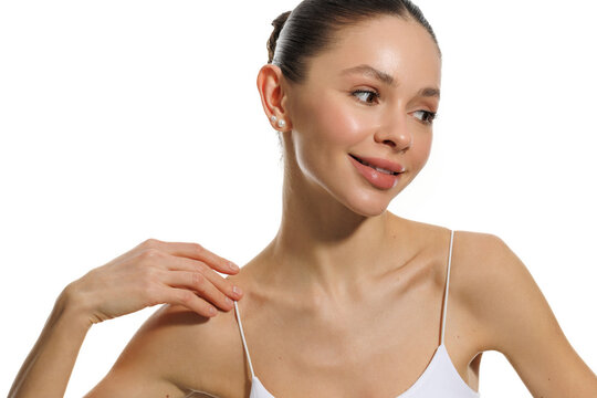 Portrait beautiful young woman with clean fresh skin. Cosmetology, beauty and spa