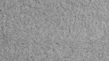 Fototapeta premium Gray concrete texture desktop wallpaper with a rough, speckled surface
