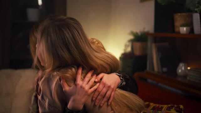Young women sharing a joyful moment indoors
