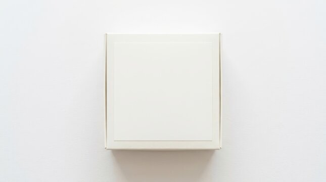 Minimal white square gift box mockup top view flat lay