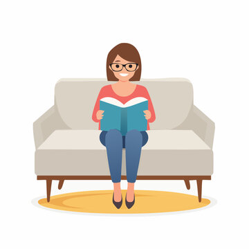 Femme lisant un livre assise sur son canap&eacute;, d&eacute;tente