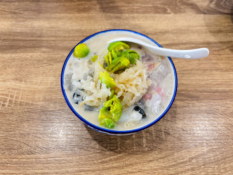 a bowl of Cendol, a traditional Southeast Asian dessert
