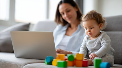Fototapeta premium Faceless professional sitting on a sofa with a laptop, a toddler playing with colorful blocks on the floor in the foreground, representing work-life balance and parenting, soft nat