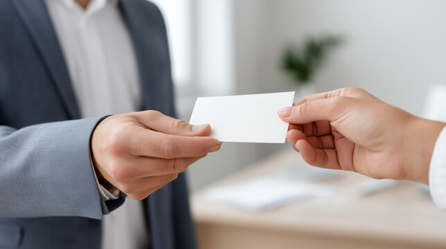 Faceless manager handing a small token of appreciation or a card to an employee, representing employee recognition and positive workplace culture, office background, gratitude, rew
