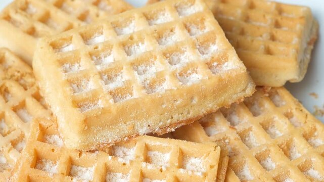 Slow Spinning Fresh Homemade Belgian Waffles Close-Up.