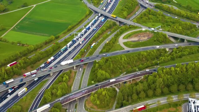 Aerial view of an Autobahn, Freeway cross roads close to the city Leonberg in south Germany on a sunny spring day