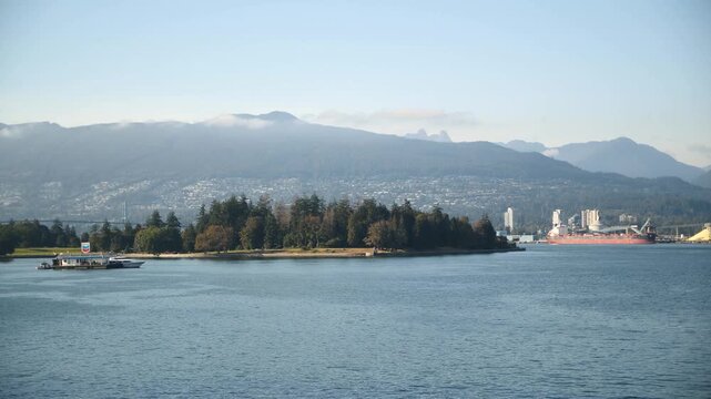 Seaplane landing near floating marine gas station in Vancouver Harbour, British Columbia, Canada. 4k footage