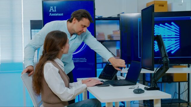 Diverse creative team of programmer develop ai assistant project together.Software engineer brainstorm about brain android robot,coding language,designer,artificial virtual intelligence with big data