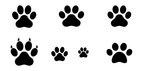 Black dog paw prints, animal footprints, pet icons, paw marks, silhouette collection © Shakil
