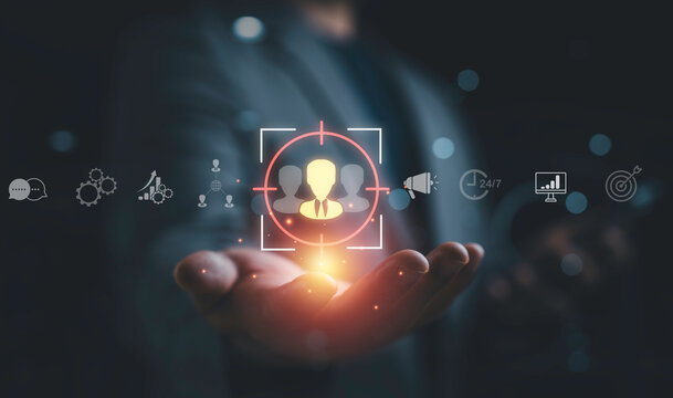 Customer focus concept with target audience icon in hand, symbol client centric strategy, user engagement, marketing analytics, customer experience and personalized service for business growth.