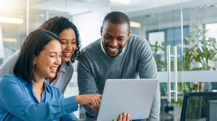 Fototapeta premium Diverse team of colleagues smiling, working on laptop against modern office corporate background.