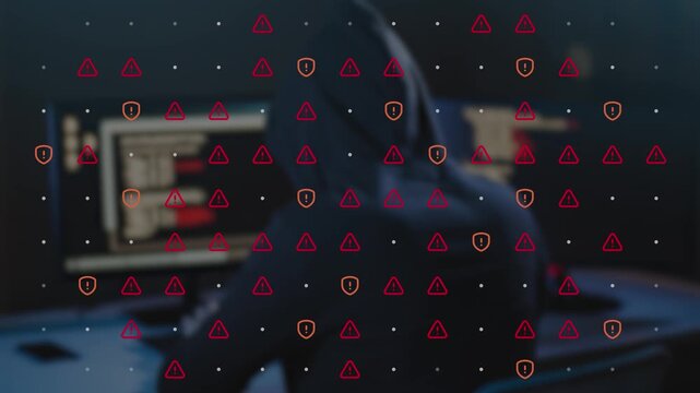 Cyber attack footage of anonymous hacker typing code and breaking database with animated red warning signs and security shields overlay