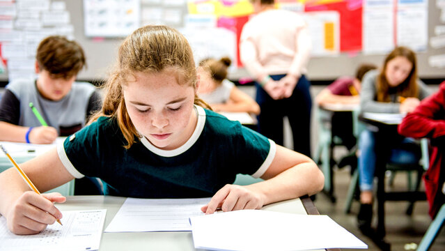 Focused students taking classroom test