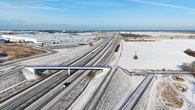 Aerial view of S3 expressway and TPV Displays Poland manufacture in winter season