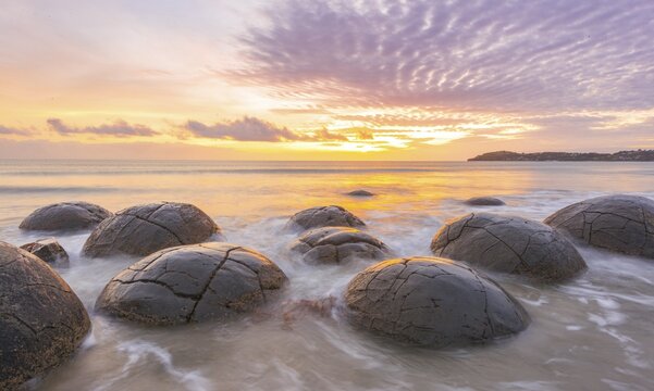 Moeraki boulders, at sunrise, geological formation, Koekohe Beach, Moeraki, East Coast, Otago, South Island, New Zealand