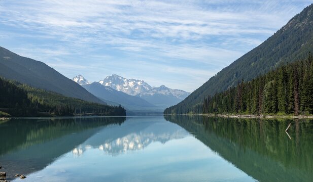 Duffey Lake, snow-capped mountains seal themselves in a lake, Joffrey Peak and Mount Matier, Duffey Lake Provincial Park, British Columbia, Canada