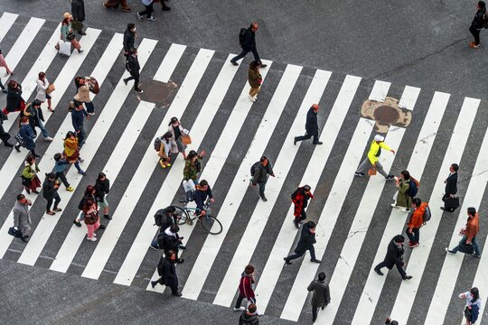 Shibuya crossing, crowds at intersection, many pedestrians and cyclists cross zebra crossing, Shibuya, Udagawacho, Tokyo, Japan