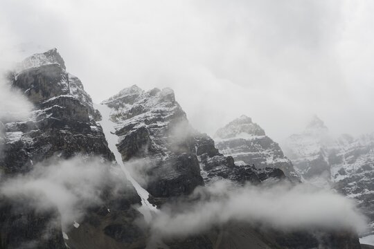 Rugged mountains, rock faces covered with clouds, Valley of the Ten Peaks, Rocky Mountains, Banff National Park, Alberta Province, Canada, North America