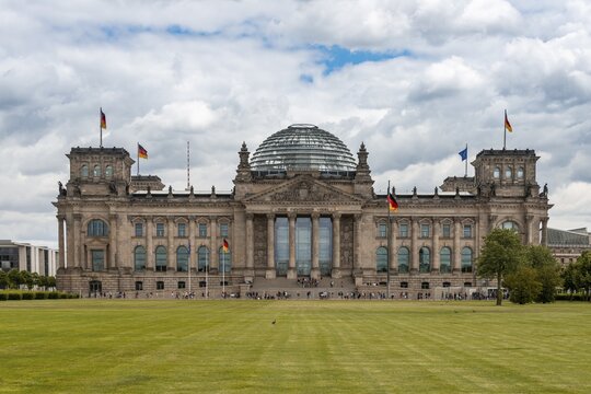 Reichstag and Germany Flag, government district, Berlin, Germany