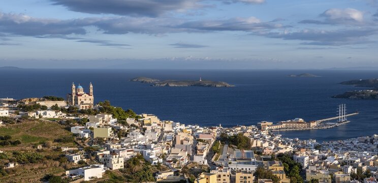 View from Ano Syros to the houses of Ermoupoli with the Anastasi Church or Church of the Resurrection, evening light, view over the sea with the islands in front of Ermoupoli, Ano Syros, Syros, Cyclades, Greece