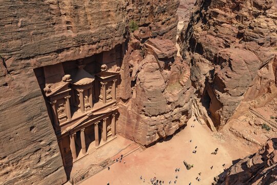 View from above into the gorge Siq, Pharaoh's treasure house carved into rock, facade of the treasure house Al-Khazneh, Khazne Faraun, mausoleum in the Nabataean city Petra, near Wadi Musa, Jordan