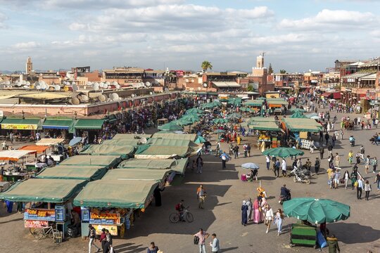 Locals on a busy place, Djemaa El Fna square, Marrakech, Morocco