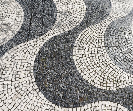 Wavy pattern in pavement, black and white, cobblestones, Rossio, Lisbon, Portugal
